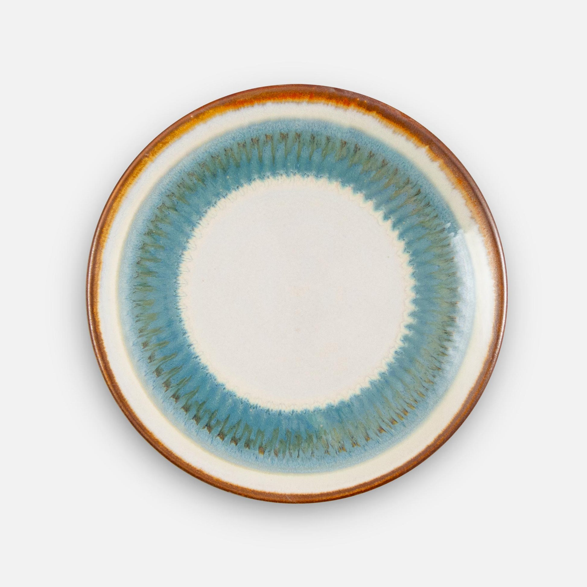 Handmade Pottery Rimless Dinner Plate made by Georgetown Pottery in Maine in Ivory Blue Oribe pattern