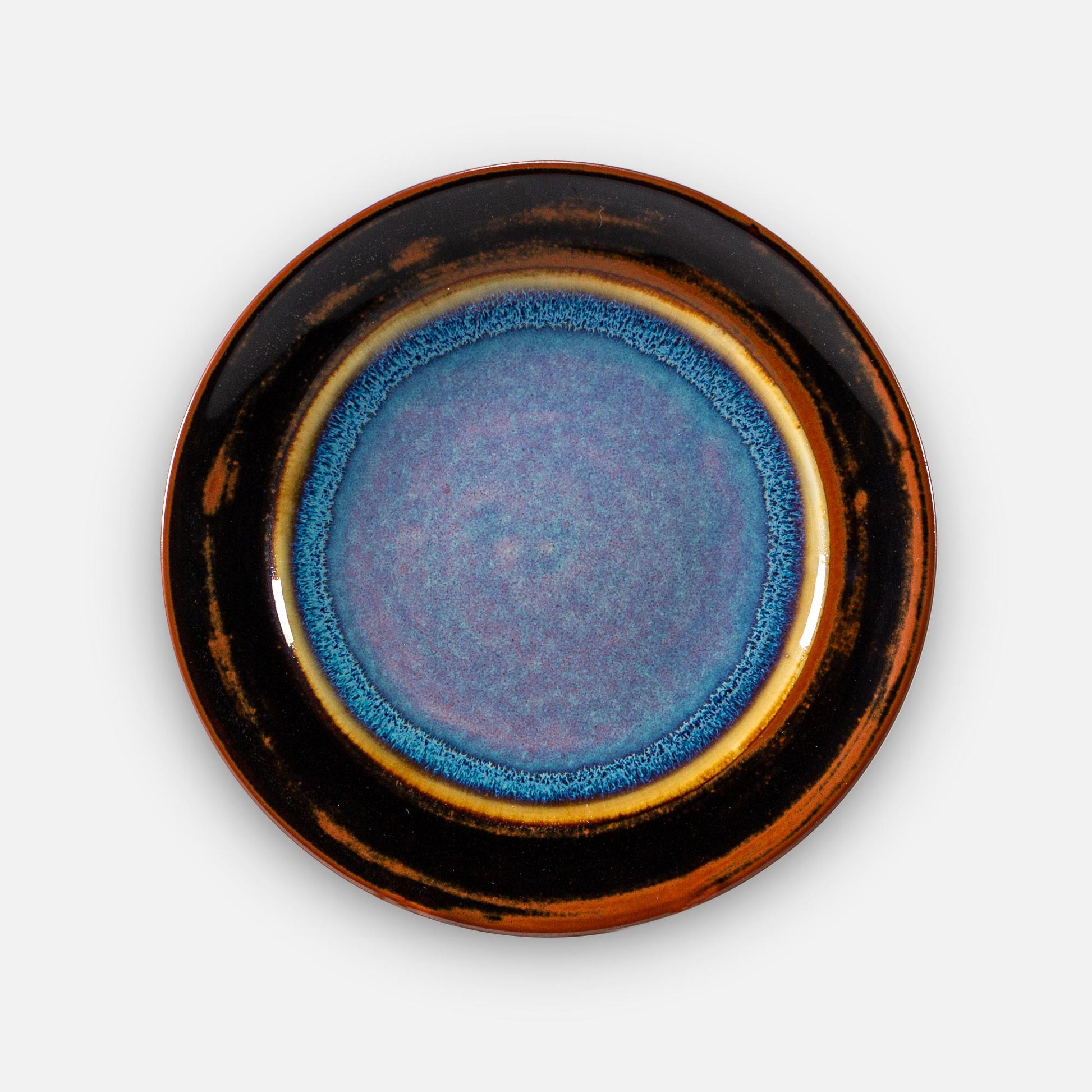 Handmade Pottery Footed Dinner Plate in Purple Hamada pattern made by Georgetown Pottery in Maine