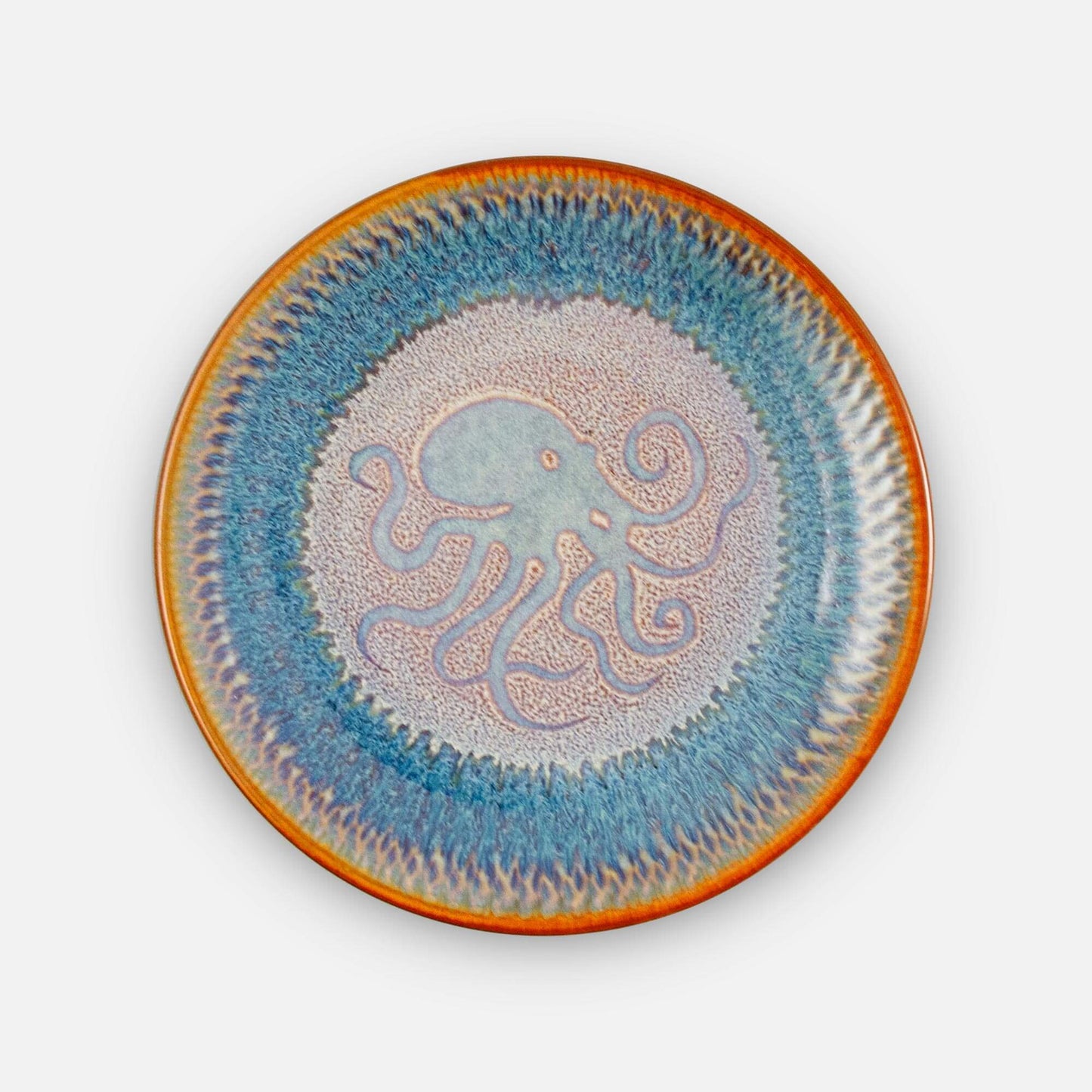 Handmade Pottery Rimless Dessert Plate made by Georgetown Pottery in Maine in Purple Octopus pattern