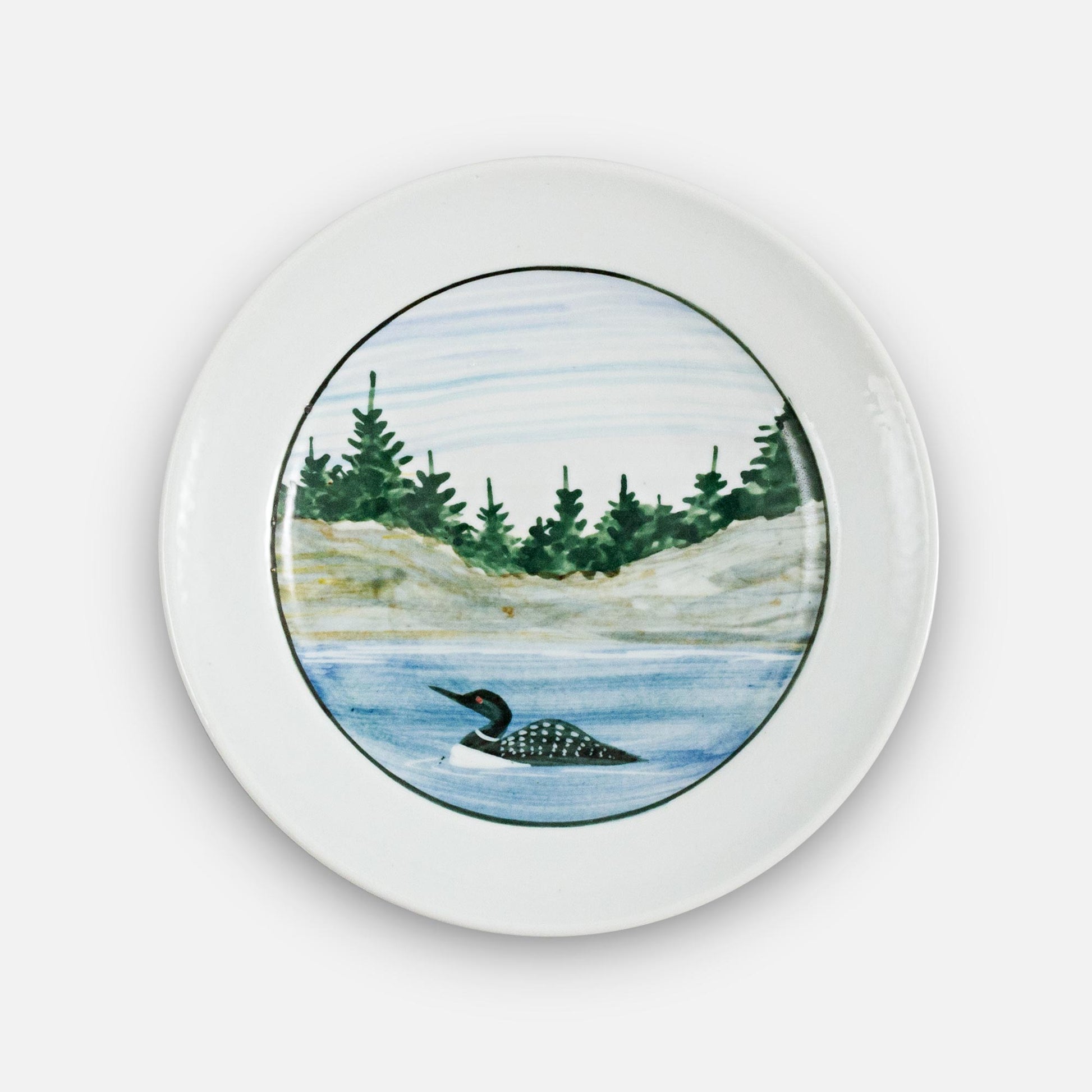 Handmade Pottery Rimless Dinner Plate made by Georgetown Pottery in Maine in Loon pattern