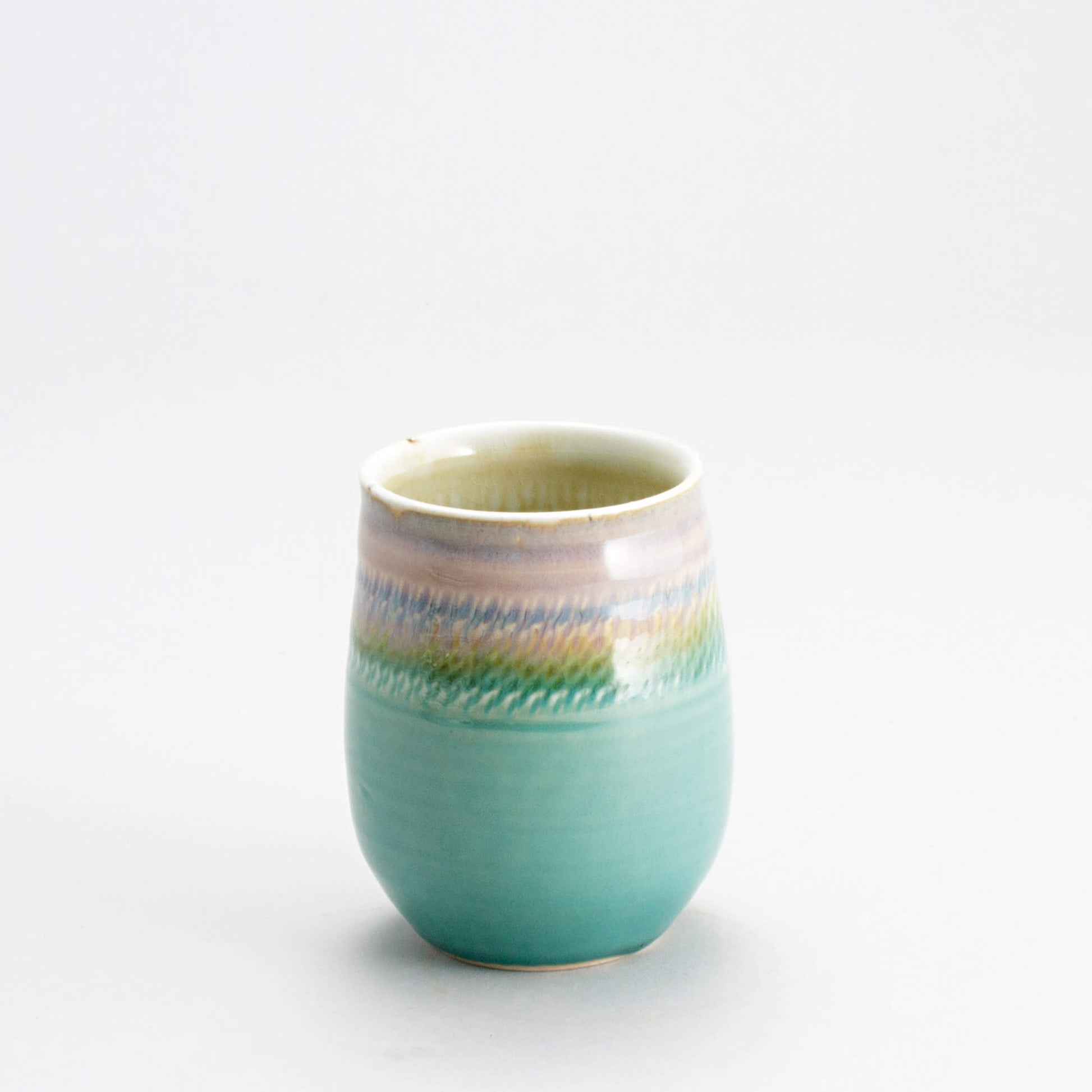 Handmade Pottery Stemless Wine Tumbler made by Georgetown Pottery in Maine Green Oribe
