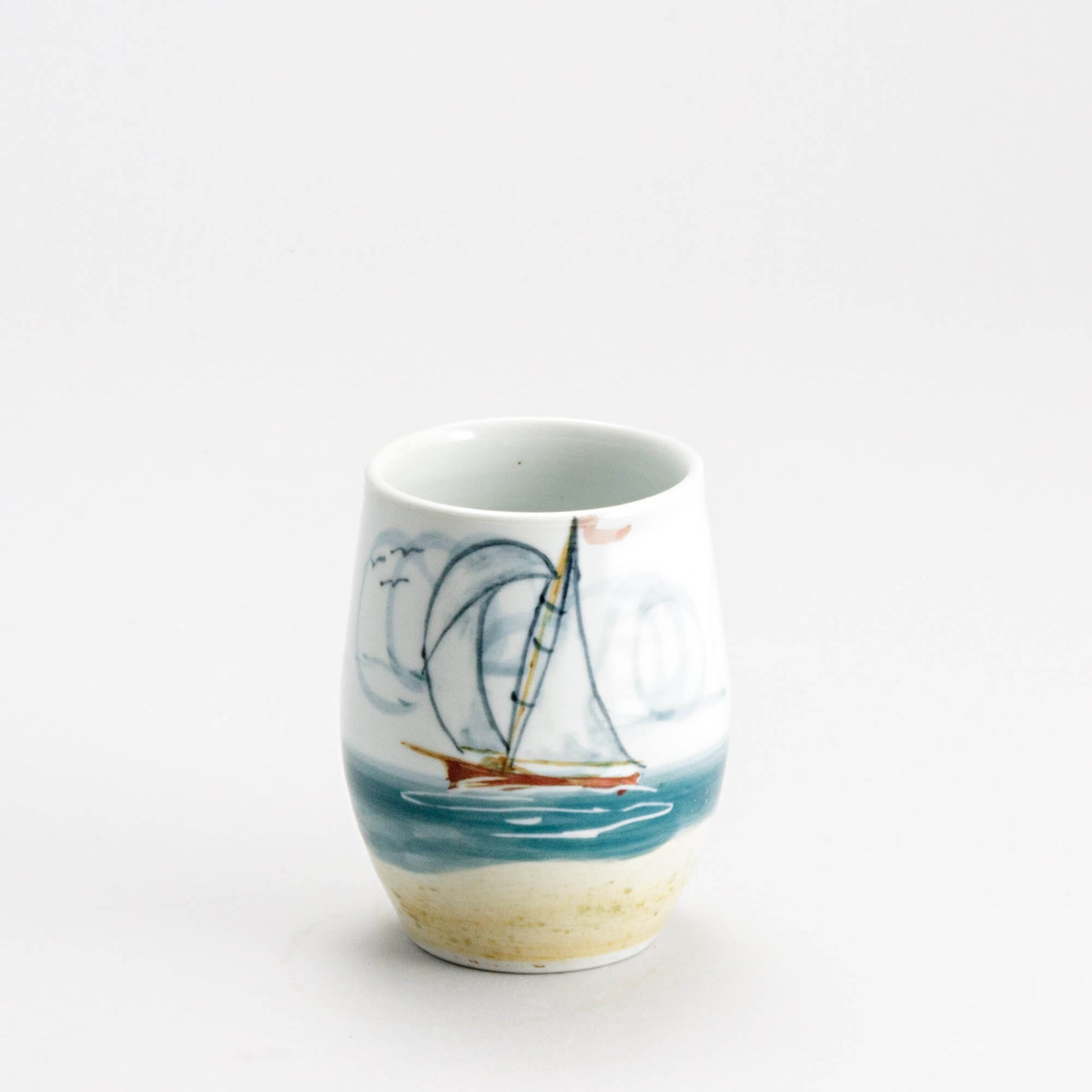 Handmade Pottery Stemless Wine Tumbler made by Georgetown Pottery in Maine Sailboat