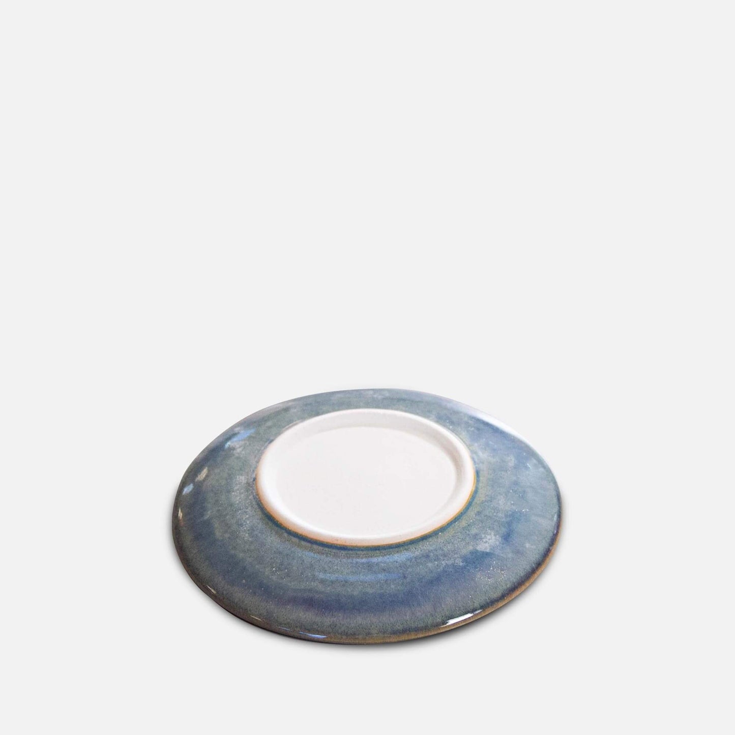 Handmade Pottery Rimless Dessert Plate made by Georgetown Pottery in Maine in Purple Tree pattern