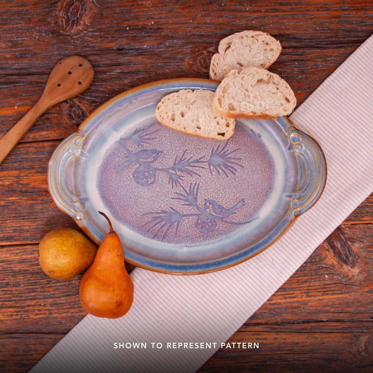 Handmade Pottery Harvest Bowl Bowl in Purple Chickadee pattern made by Georgetown Pottery in Maine