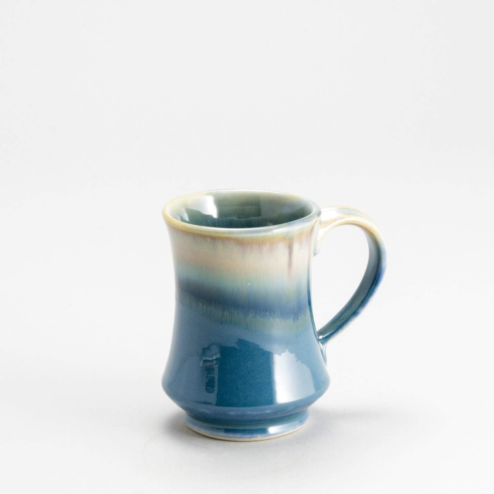 Handmade Pottery Pedestal Mug made by Georgetown Pottery in Maine Blue Oribe