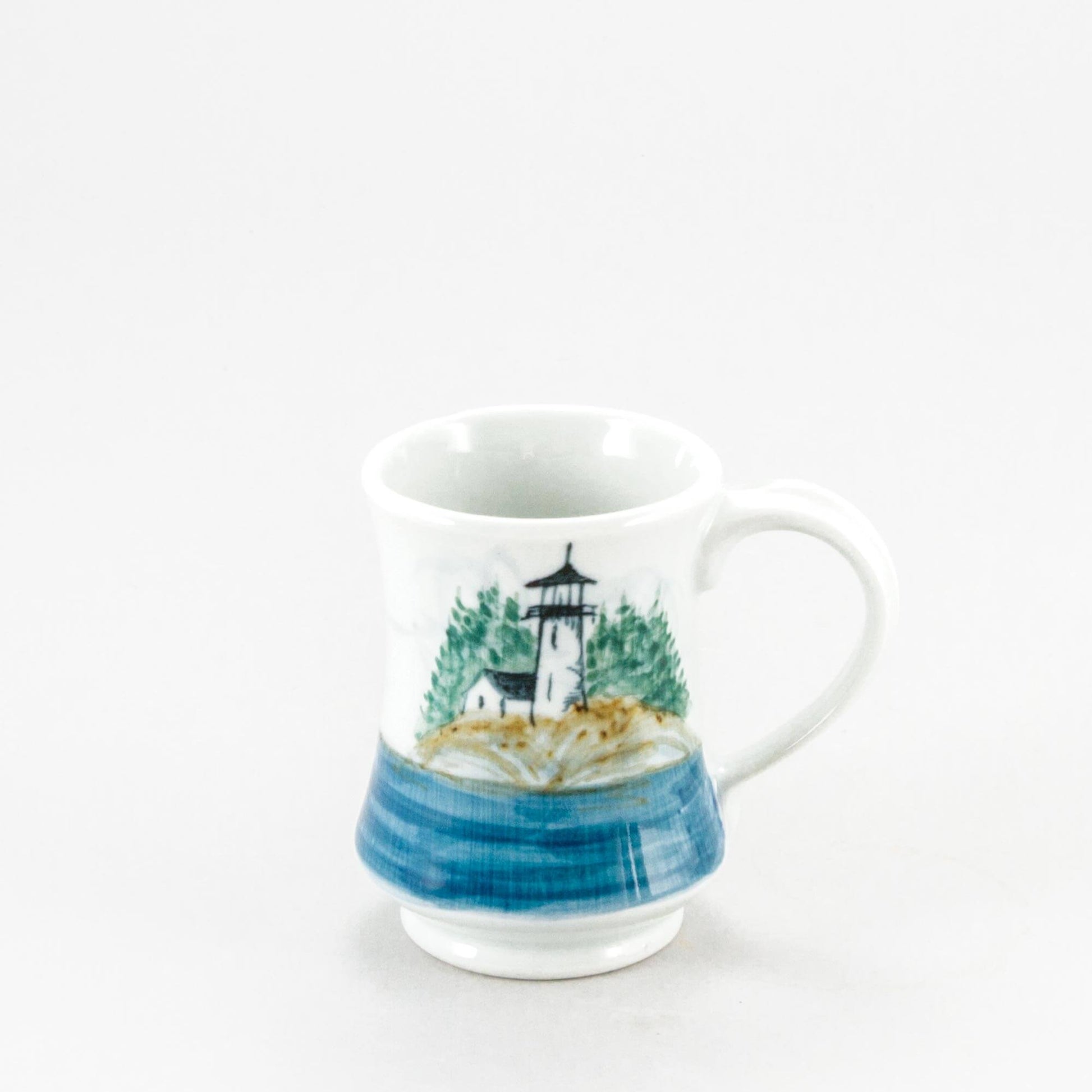 Handmade Pottery Pedestal Mug made by Georgetown Pottery in Maine Lighthouse
