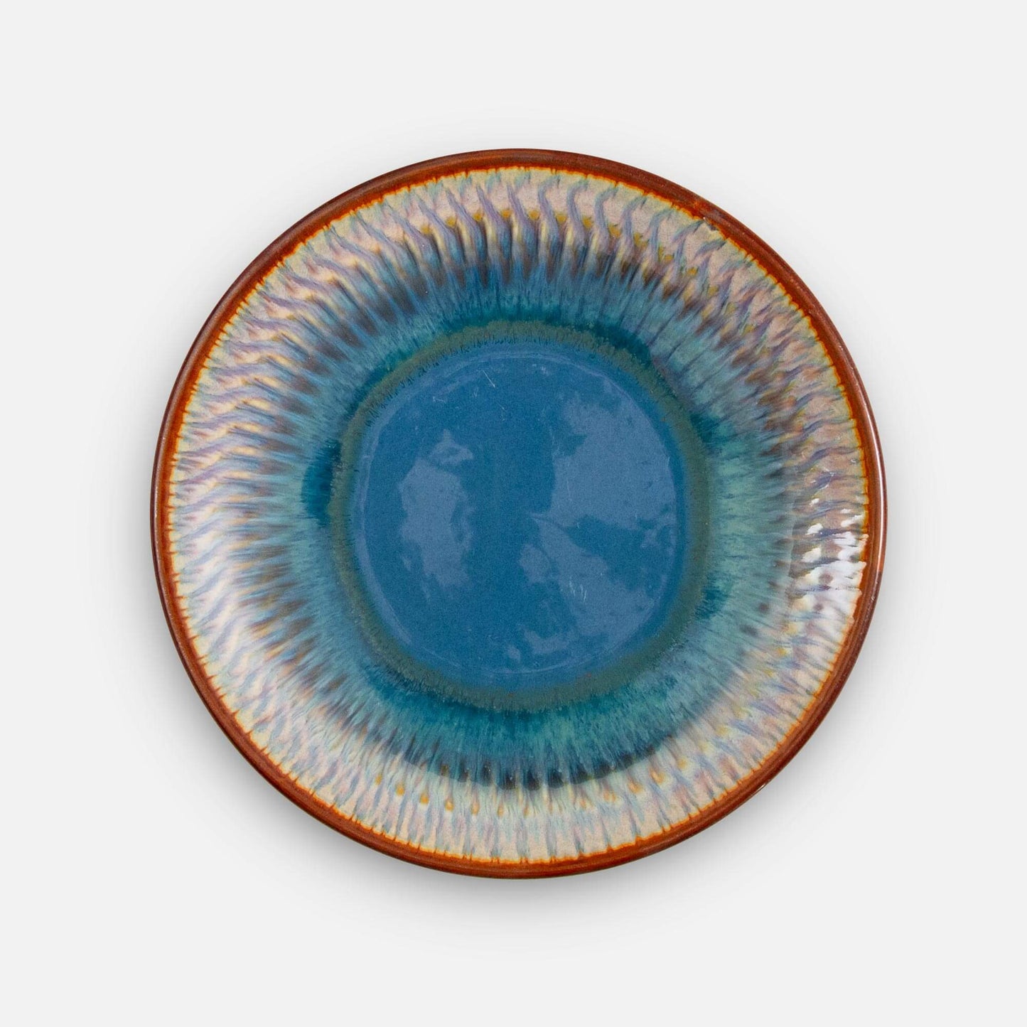 Handmade Pottery Footed Dinner Plate in Blue Oribe pattern made by Georgetown Pottery in Maine