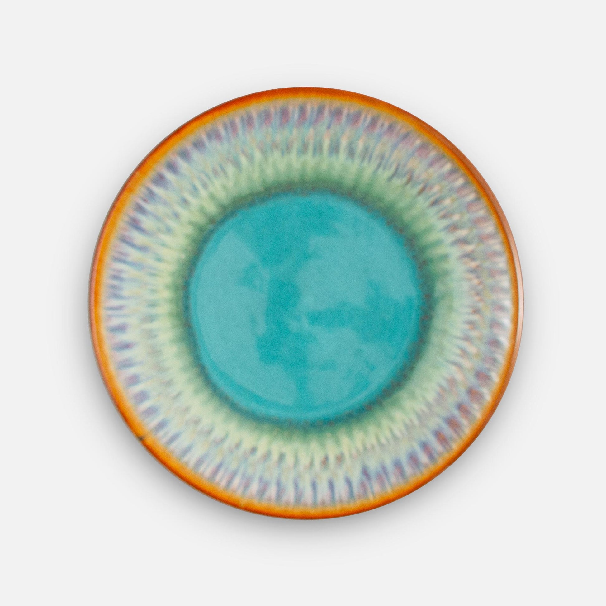 Handmade Pottery Rimless Dinner Plate made by Georgetown Pottery in Maine in Green oribe purple pattern