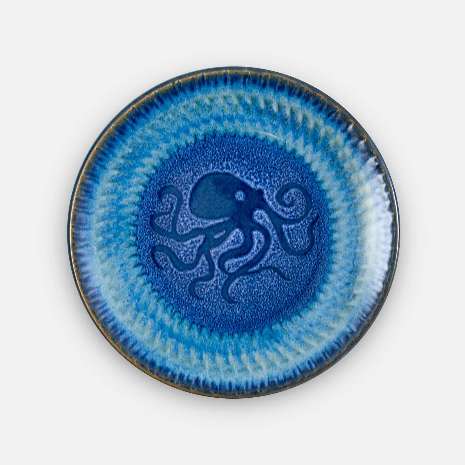 Handmade Pottery Rimless Dinner Plate made by Georgetown Pottery in Maine in Blue Octopus pattern