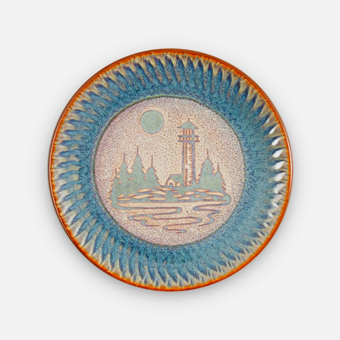 Handmade Pottery Rimless Dinner Plate made by Georgetown Pottery in Maine in Purple Lighthouse pattern