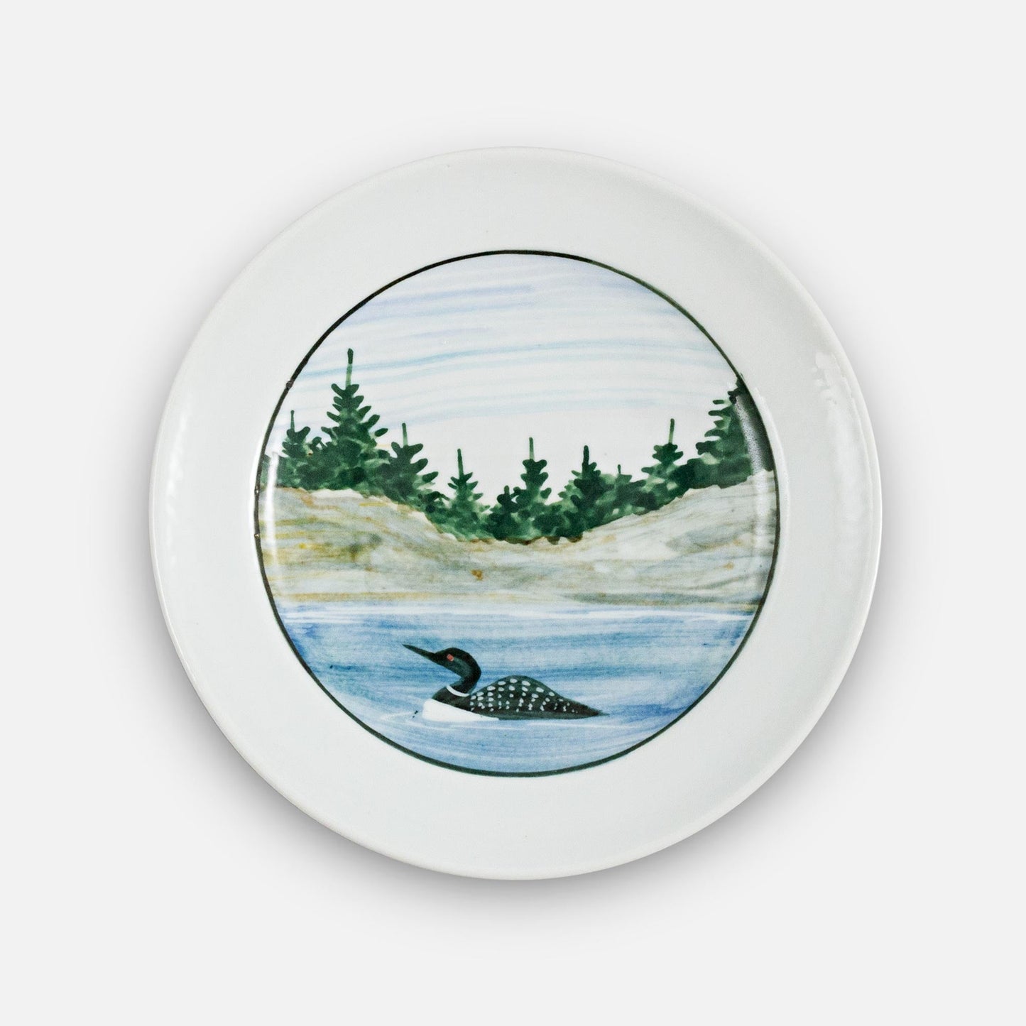 Handmade Pottery Rimless Dessert Plate made by Georgetown Pottery in Maine in Loon pattern