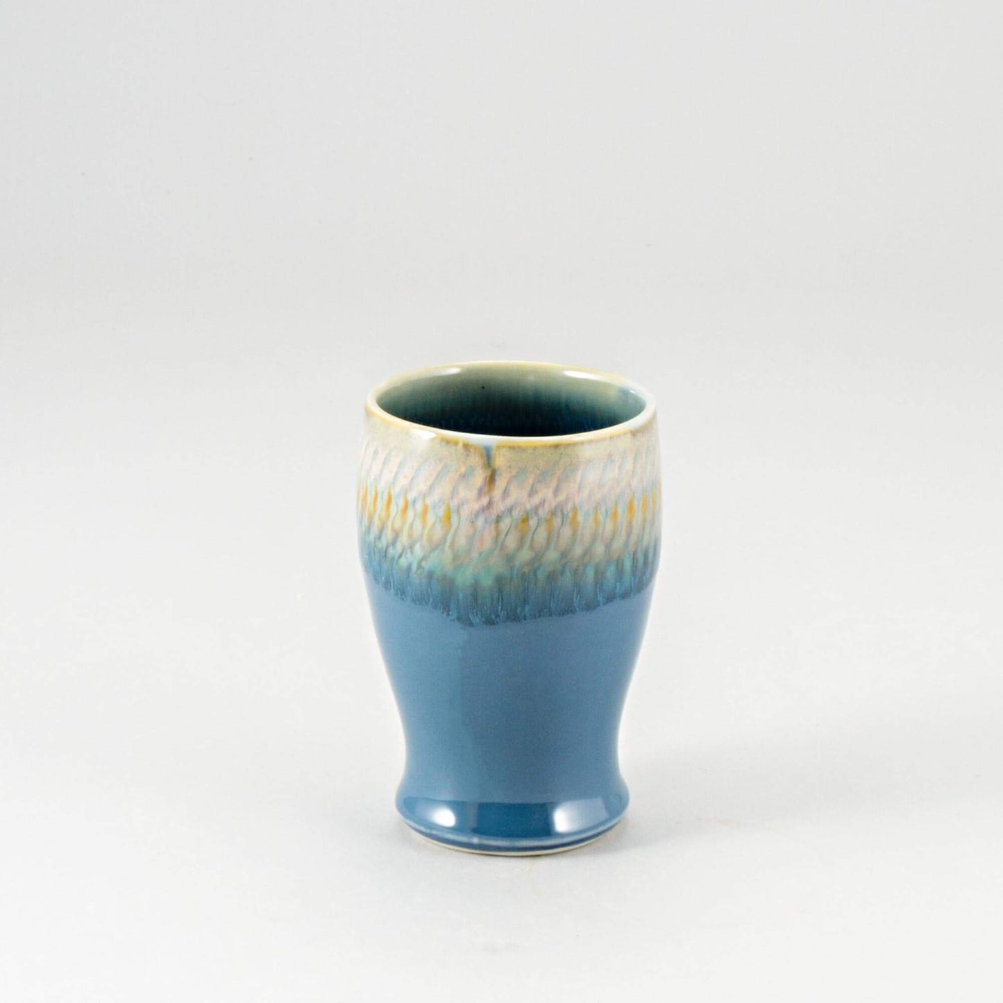 Handmade Pottery Curvy Tumbler in Blue Oribe pattern made by Georgetown Pottery in Maine