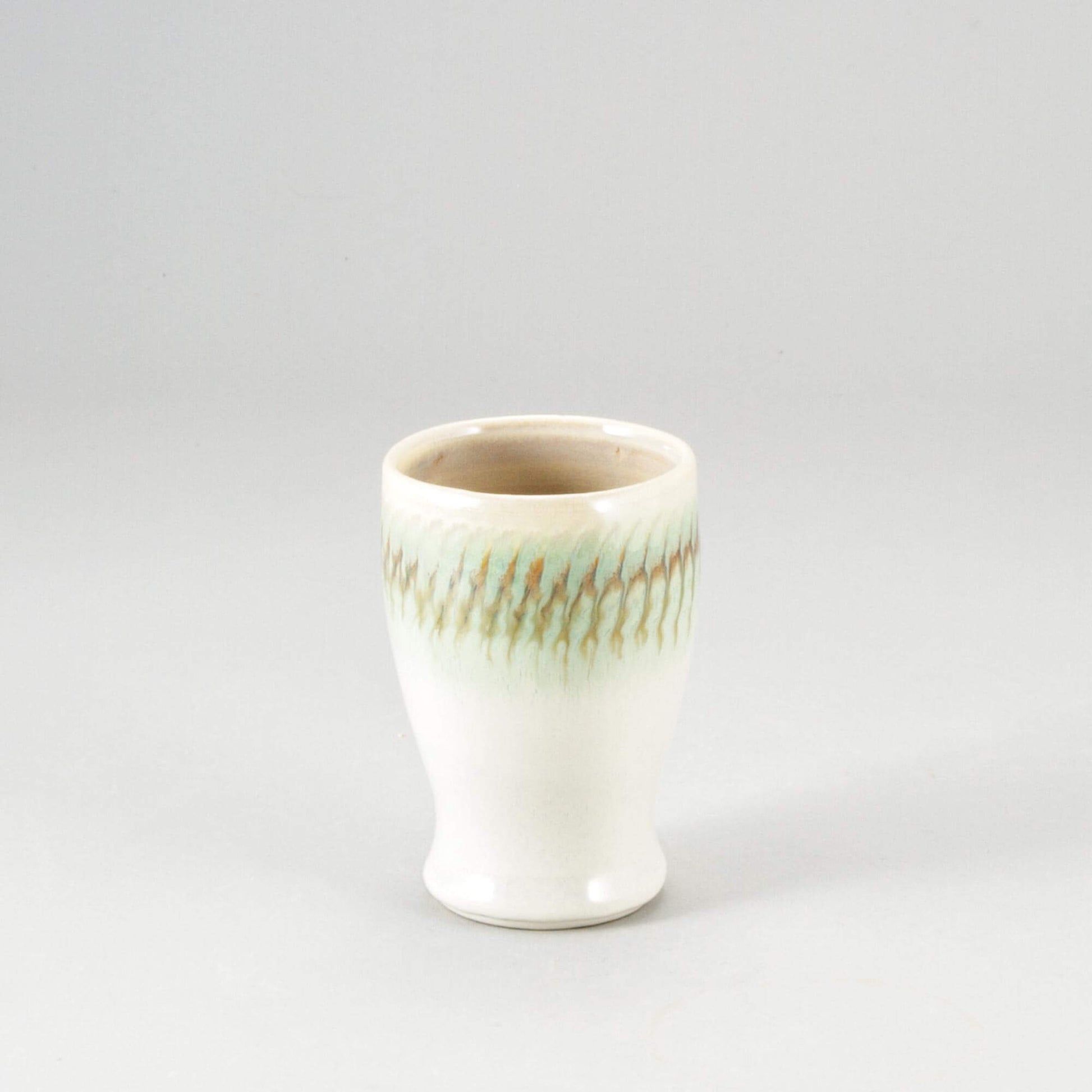 Handmade Pottery Curvy Tumbler in Ivory & Green pattern made by Georgetown Pottery in Maine