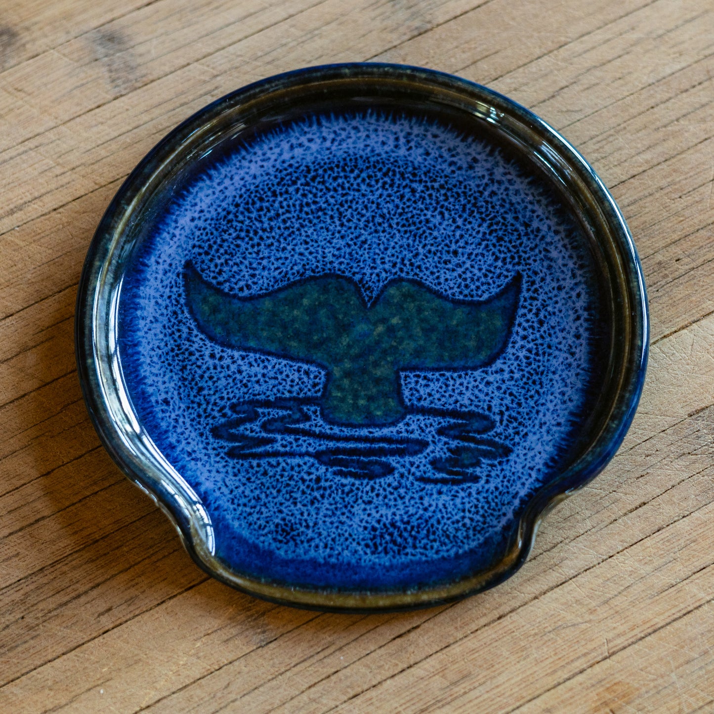 Handmade ceramic Spoon Rest in Blue Whale Tail pattern made by Georgetown Pottery in Maine