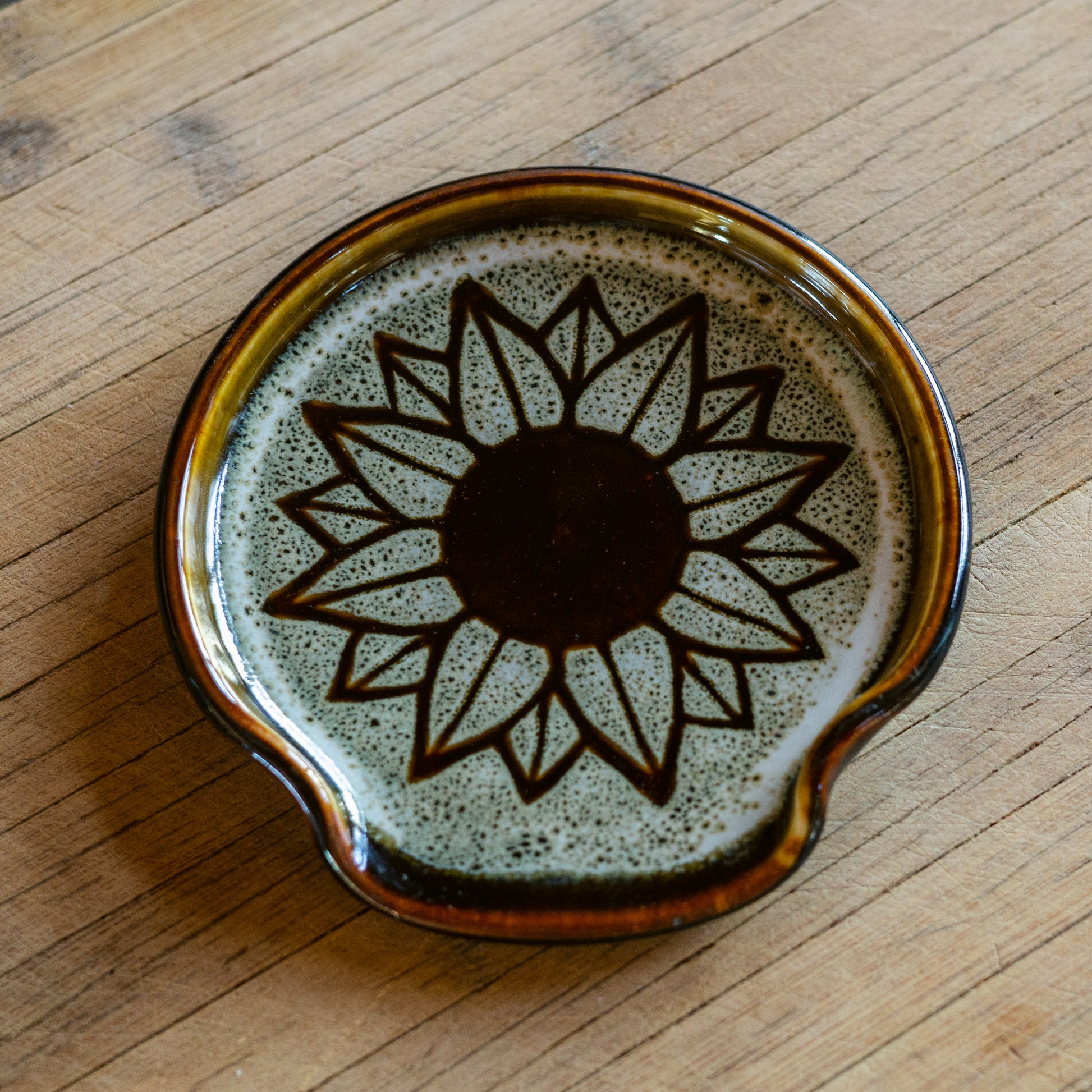 Handmade ceramic Spoon Rest in Hamada Sunflower pattern made by Georgetown Pottery in Maine