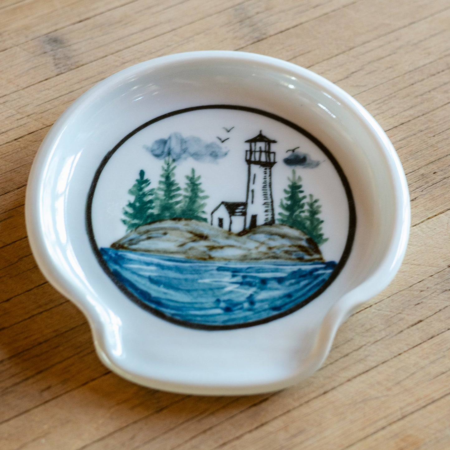 Handmade ceramic Spoon Rest in Lighthouse pattern made by Georgetown Pottery in Maine