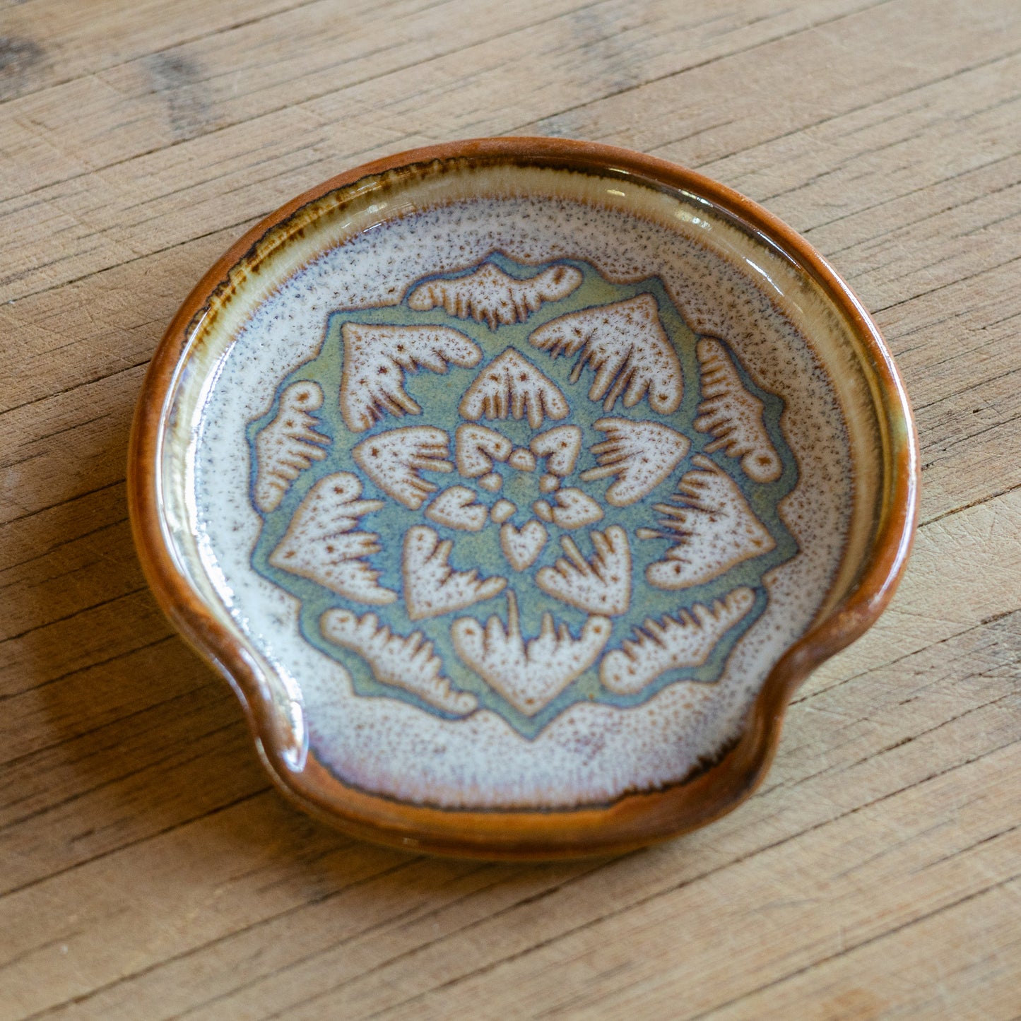 Handmade ceramic Spoon Rest in Purple Celtic Flower pattern made by Georgetown Pottery in Maine