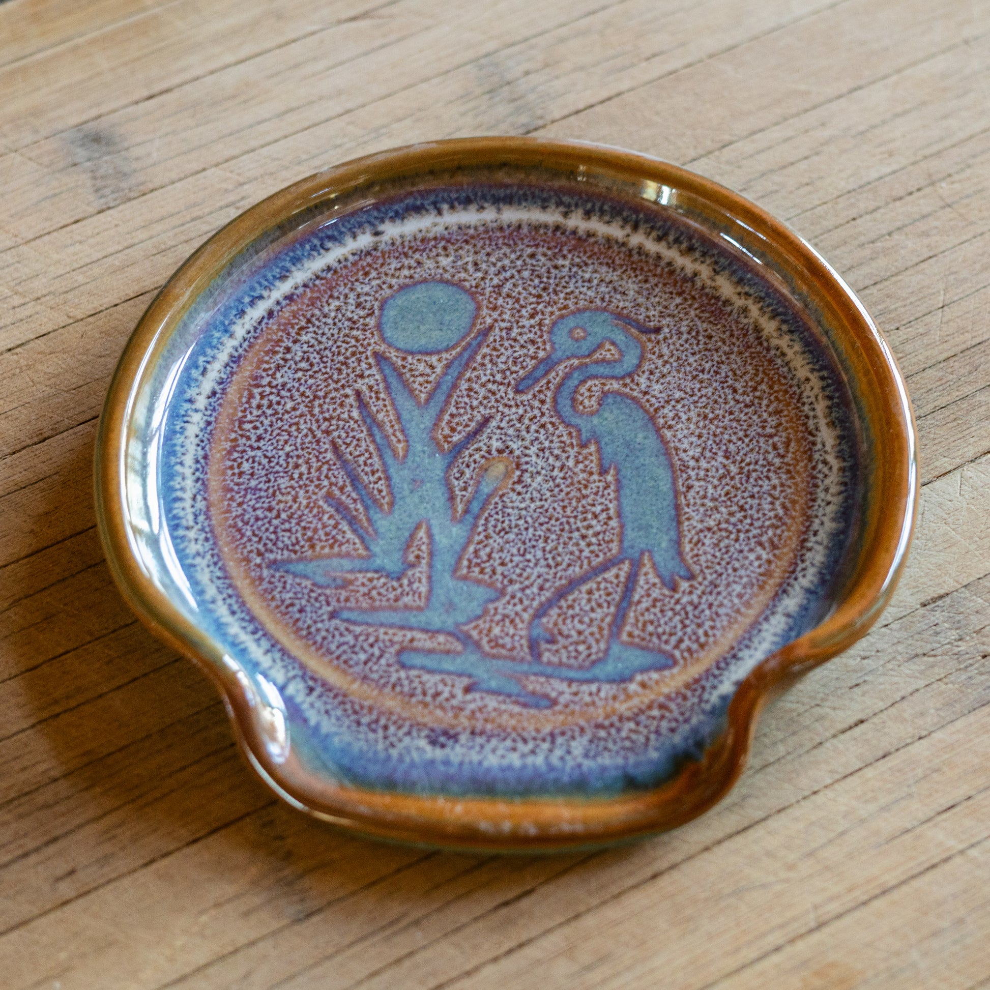 Handmade ceramic Spoon Rest in Purple Heron pattern made by Georgetown Pottery in Maine