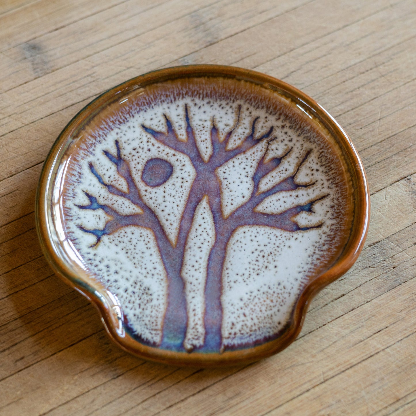 Handmade ceramic Spoon Rest in Purple Tree pattern made by Georgetown Pottery in Maine